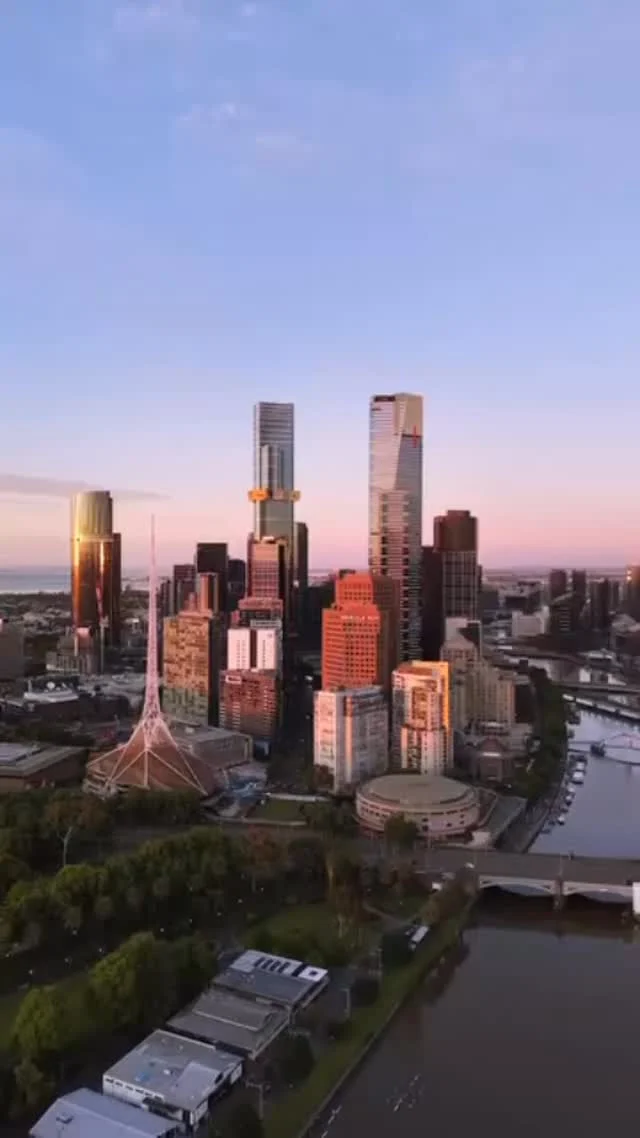 Good morning, Melbourne! There’s nothing quite like waking up to views like this! Can you spot the iconic Eureka Tower standing tall against the colourful skyline? 🌤️ 

🎥 Shot by the talented @aerial.melbourne

#melbourneskydeck #eurekatower #melbournecity #sunrise #artcentre #melbournecbd